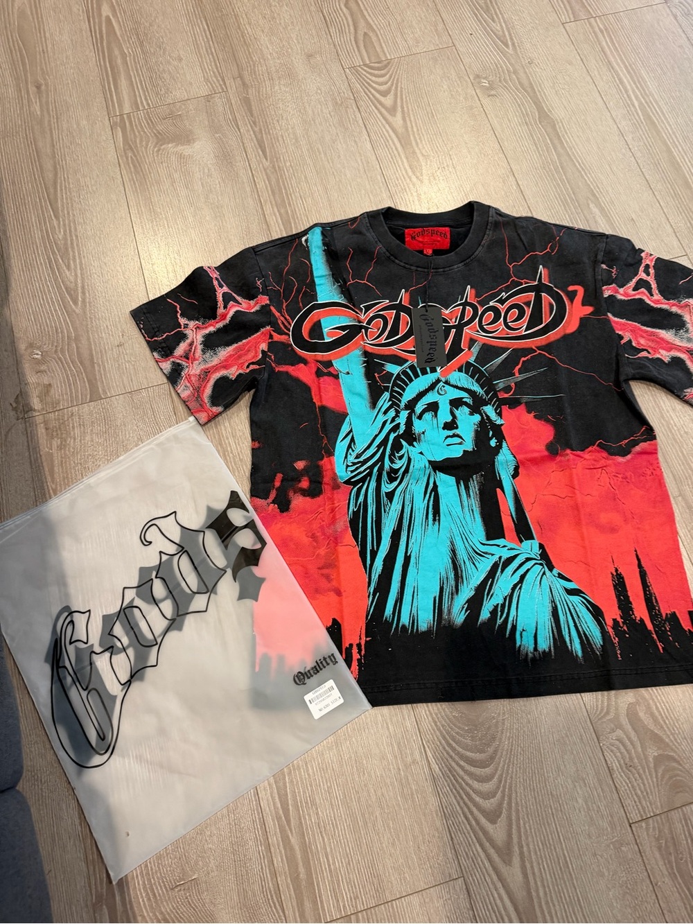 Godspeed Statue Graphic Short-Sleeve Tee in Black, Red & Teal
